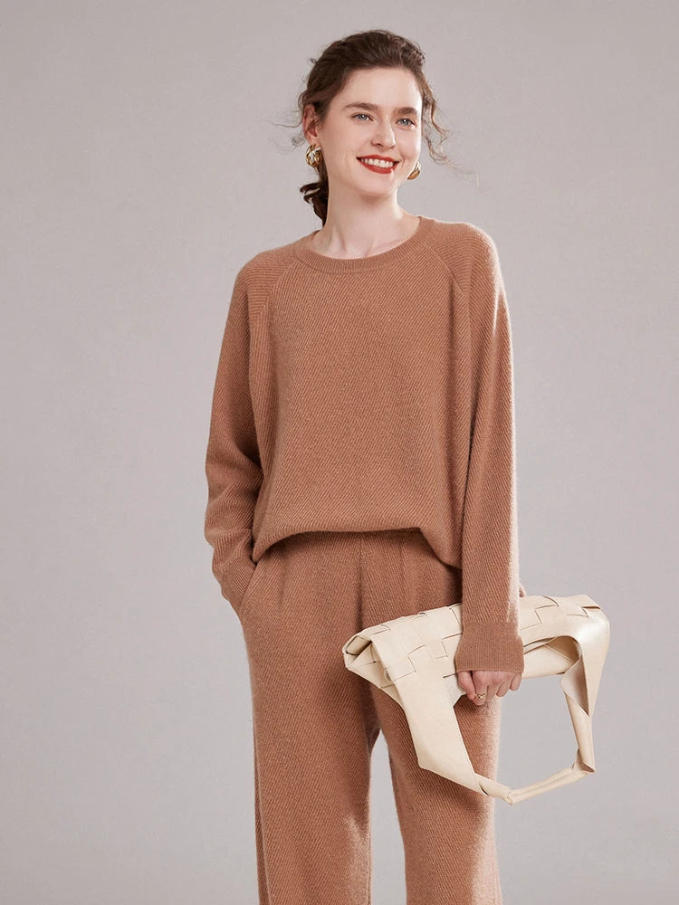 Women’s cashmere set in diagonal knit texture with relaxed sweater and straight-leg pants — shown in color Café Au Lait. From Borcelleclothes.