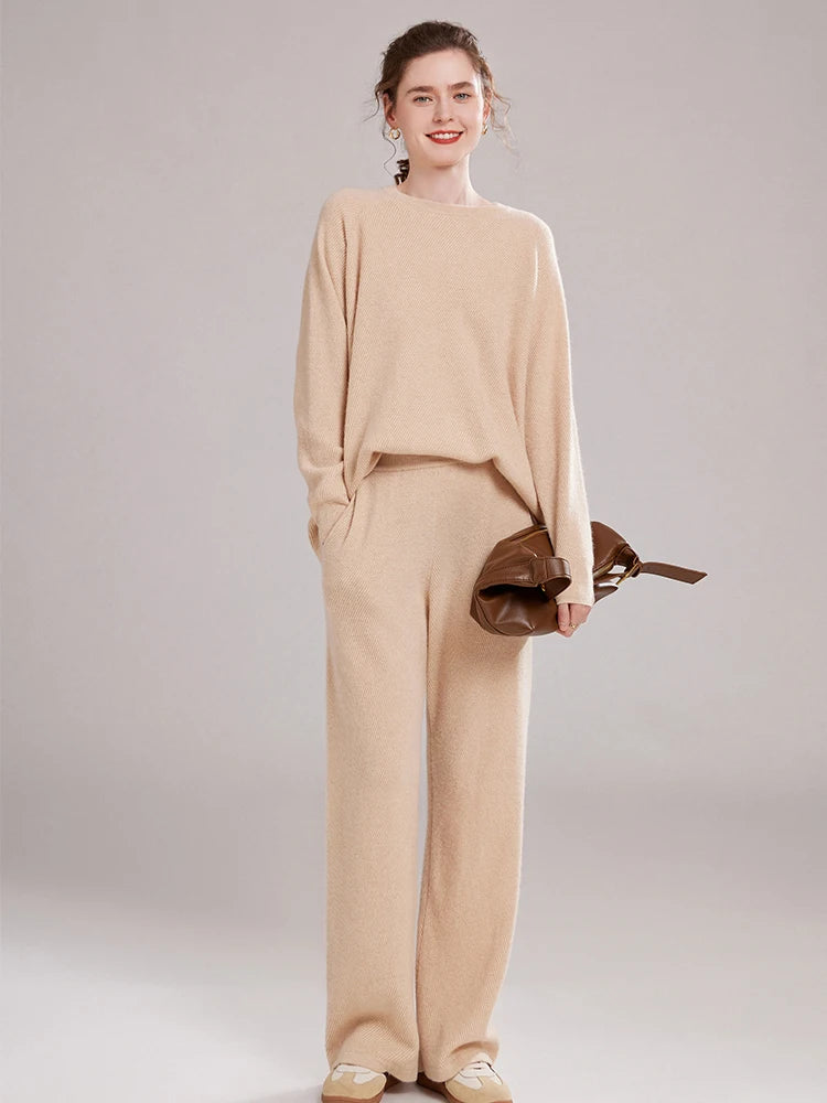 Women’s cashmere set in diagonal knit texture with relaxed sweater and straight-leg pants — shown in color Vanilla. From Borcelleclothes.
