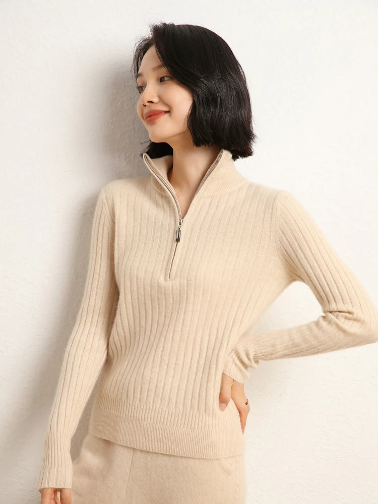 Women’s cashmere half-zip sweater in Almond, featuring shifting rib textures, with stand collar and sculpted finish at hem and cuffs — From Borcelleclothes.