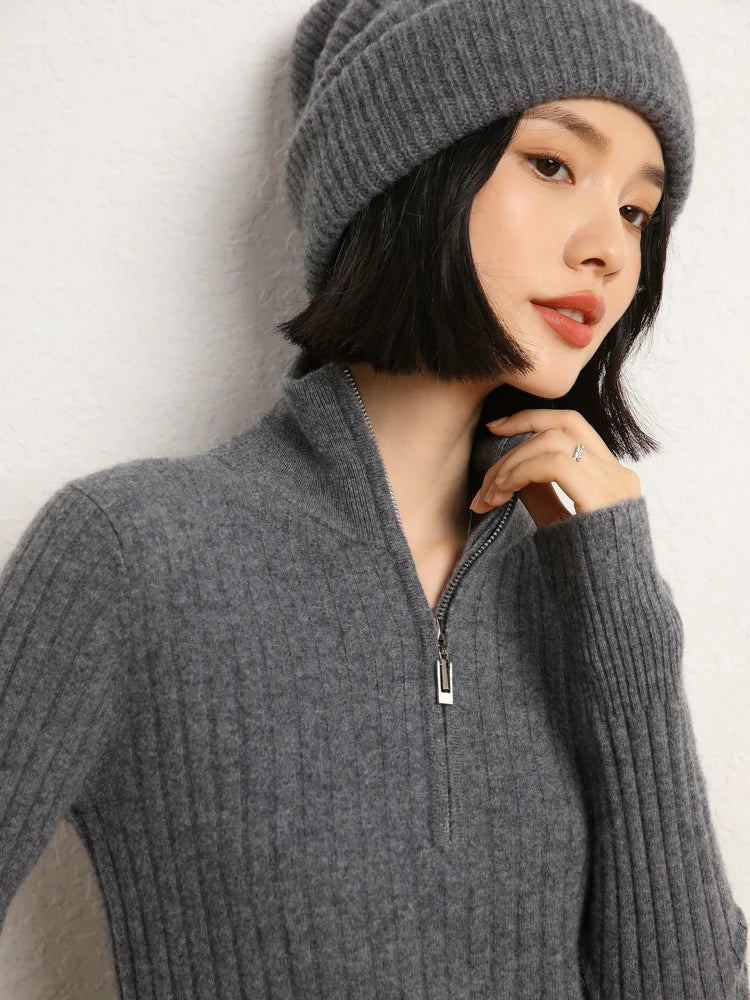 Model touching collar of cashmere sweater in shifting ribs, Davy Grey — From Borcelleclothes.