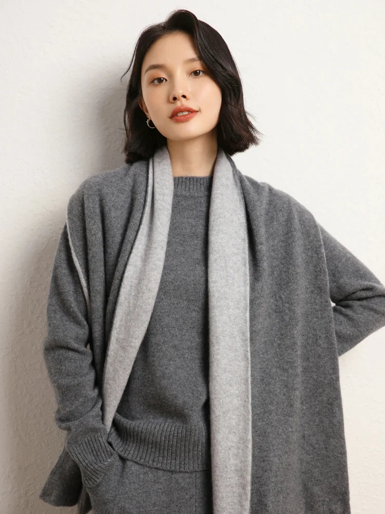Woman in Dove Grey cashmere sweater styled with matching cardigan – From Borcelleclothes.