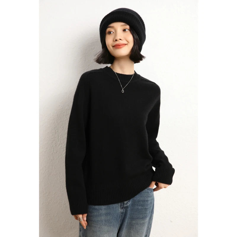 Women’s slim-fit sweater in 100% Alashan cashmere with saddle sleeves, ribbed crew neck, and 2x2 ribbed cuffs and hem, shown in Onyx color — From Borcelleclothes.