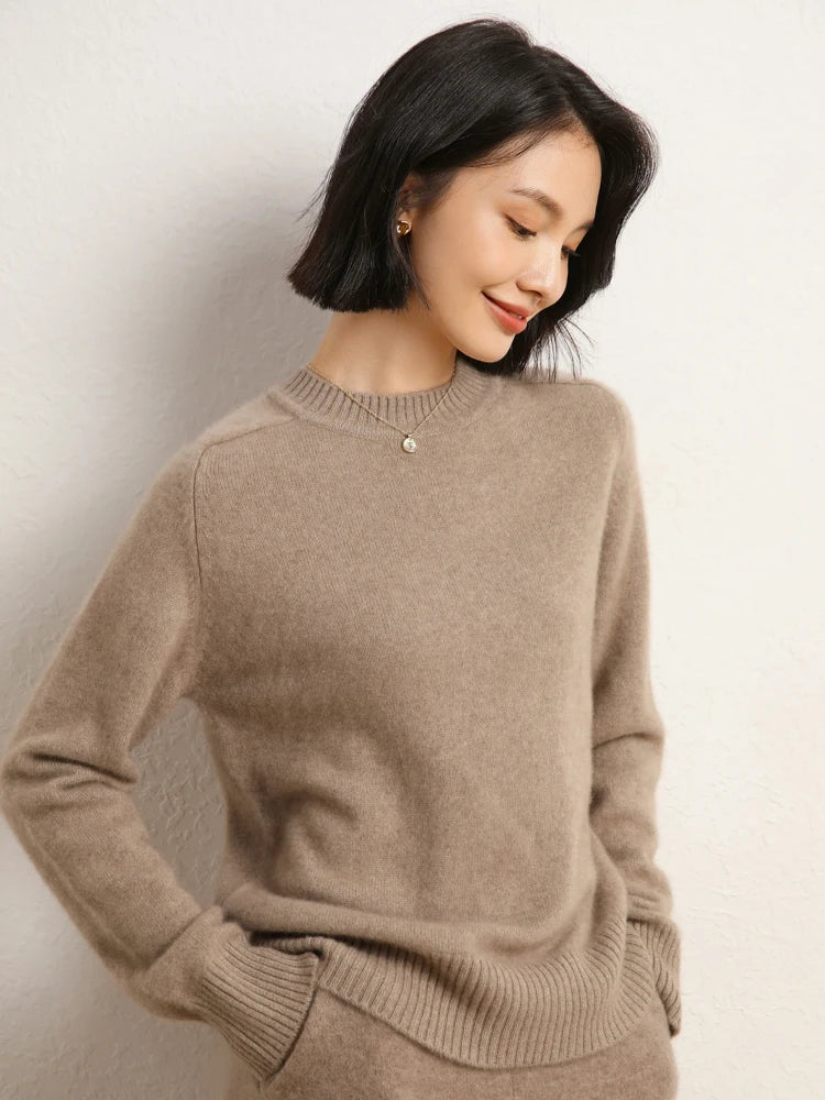 Woman in Pale Taupe cashmere sweater with hands in matching pants pockets – From Borcelleclothes.
