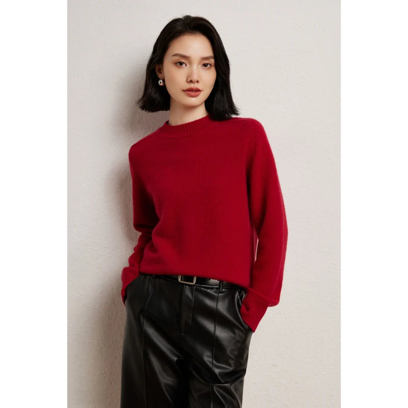Women’s slim-fit sweater in 100% Alashan cashmere with saddle sleeves, ribbed crew neck, and 2x2 ribbed cuffs and hem, shown in Red Devil color — From Borcelleclothes.