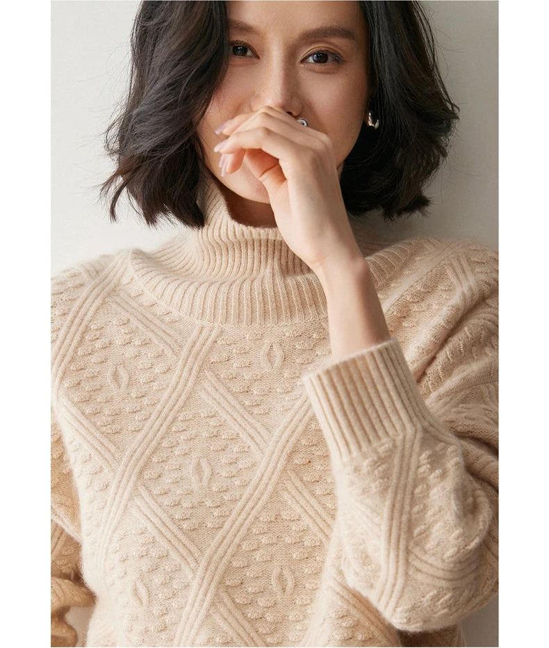 Upper view of Almond cashmere sweater showing neckline, raised ovals, and soft bobble texture — From Borcelleclothes.