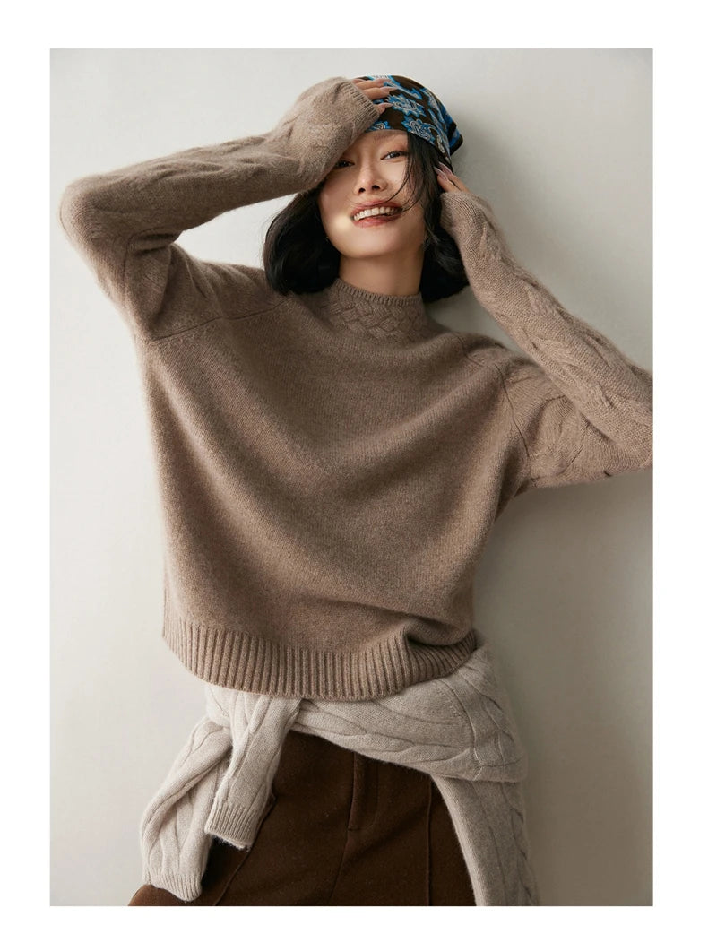 Model in Almond Frost cashmere sweater adjusting headscarf with both hands — From Borcelleclothes.