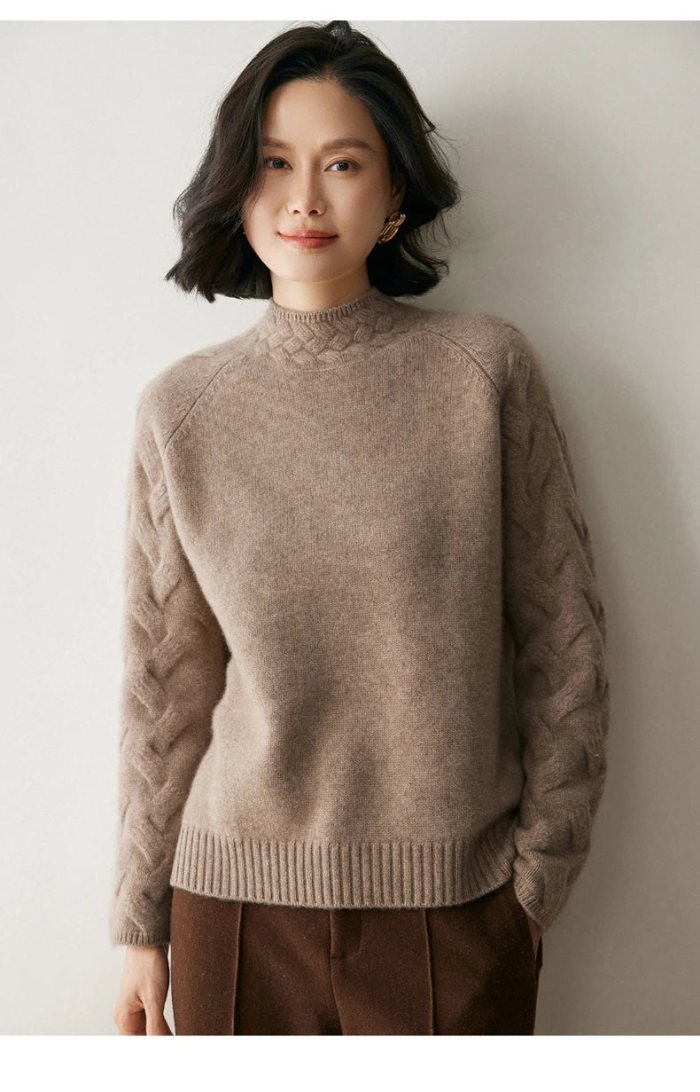 Model wears Almond Frost cashmere sweater with hand in pants pocket — From Borcelleclothes.