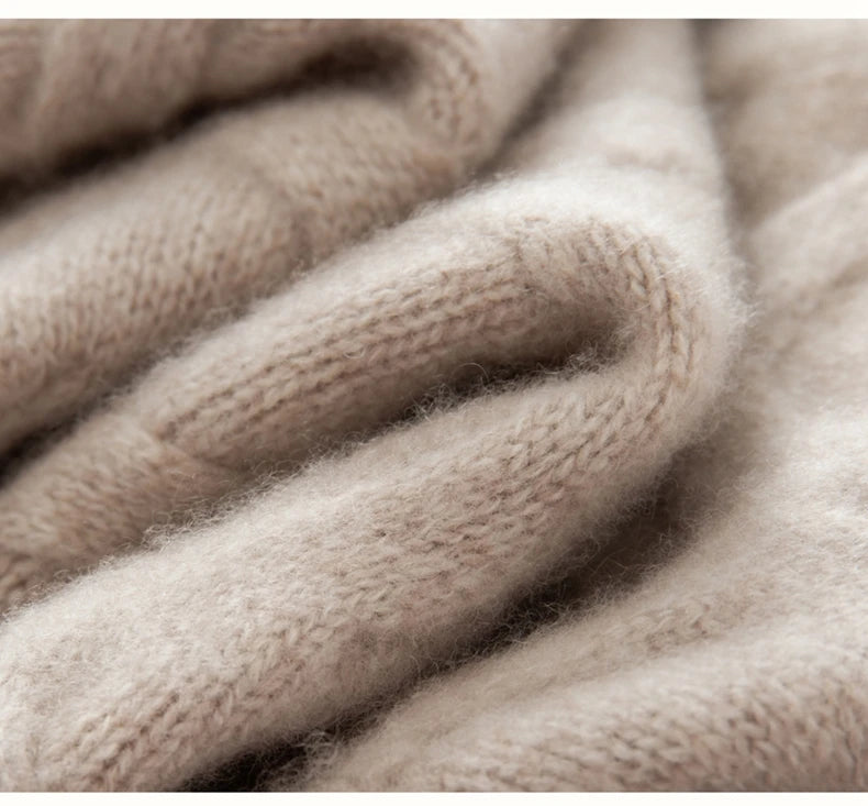 Silver Pink cashmere sweater folded to show wave-like textured detail of the abstract hearts — From Borcelleclothes.