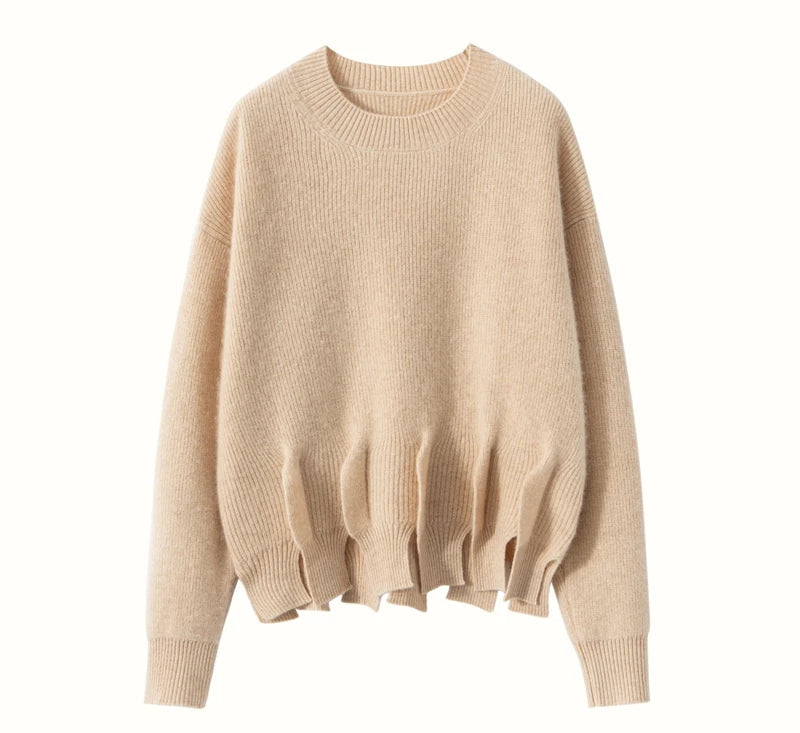 Front draping of vanilla cashmere sweater emphasizing sculpted silhouette – From Borcelleclothes.