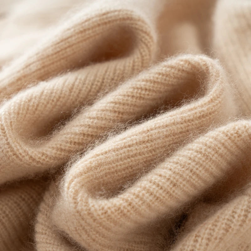 Wave-like folded texture detail of vanilla cashmere sweater fabric – From Borcelleclothes.