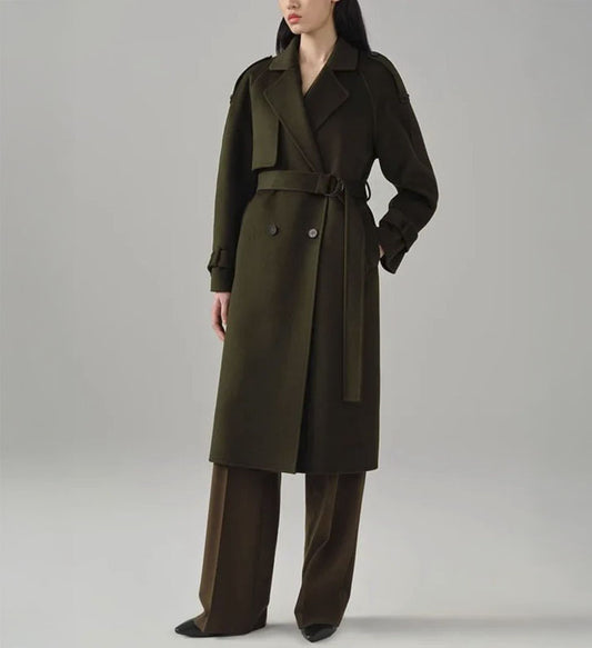 Women's Tibetan Cashmere Trench Coat in Birch, featuring a luxurious military-inspired design with a single storm flap, adjustable sleeve tabs, and a belted waist for a refined, tailored silhouette. From Borcelleclothes.