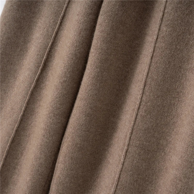 Front tuck detail of pastel brown cashmere trousers — From Borcelleclothes.