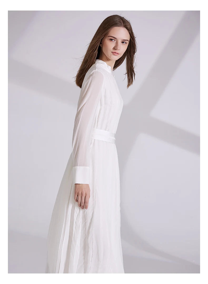 Model in chiffon silk dress, shown in side profile without vest. From Borcelleclothes.