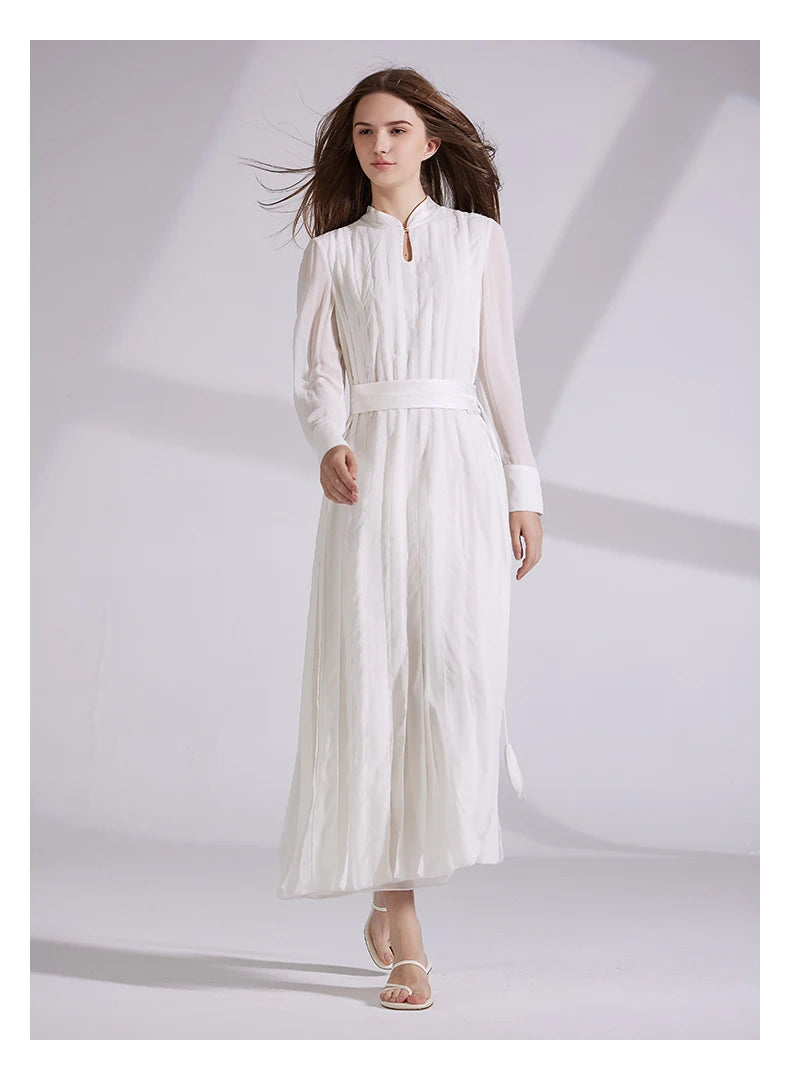 Model wearing the chiffon dress walking forward gracefully. From Borcelleclothes.