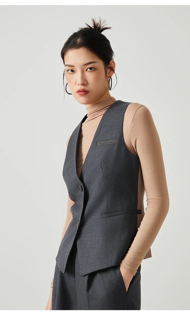 Model wearing the Classical V-neckline vest in Davy Grey with hands in pants pockets — From Borcelleclothes.