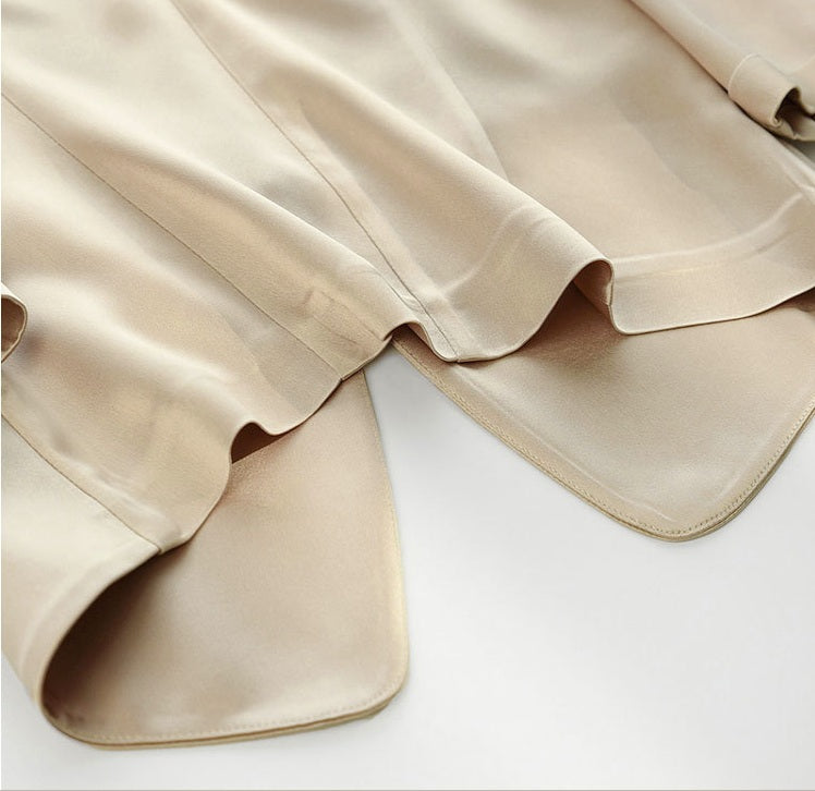 Lower part of the Pearl Bush jacket — extended, rounded panels that move outward in a gentle, fluid gesture. From Borcelleclothes.