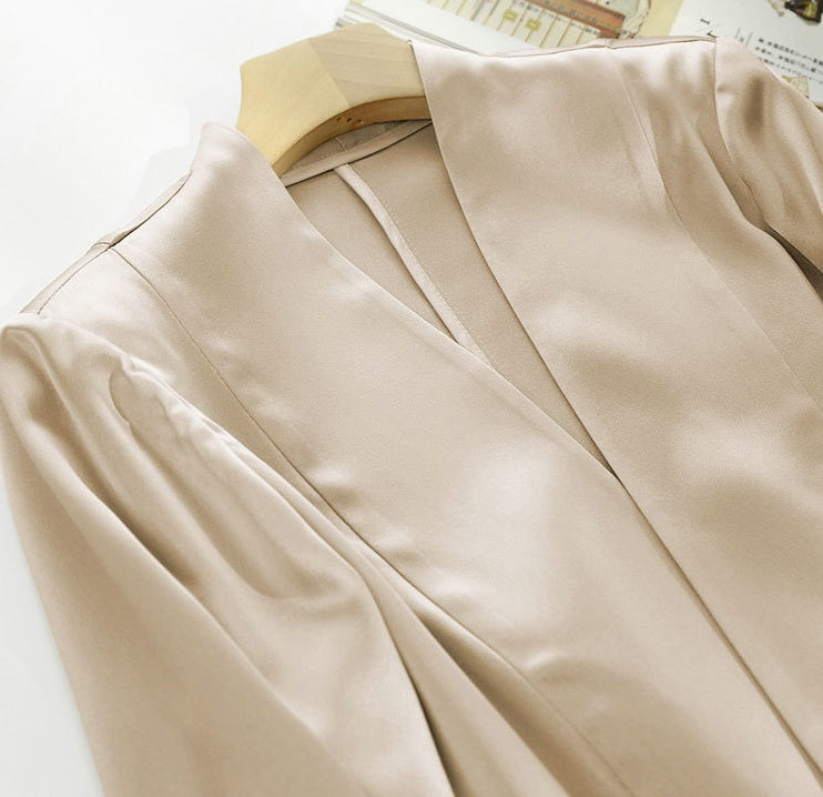 Upper part of the Pearl Bush silk jacket — architectural front panels with no collar, offering structure with openness. From Borcelleclothes.