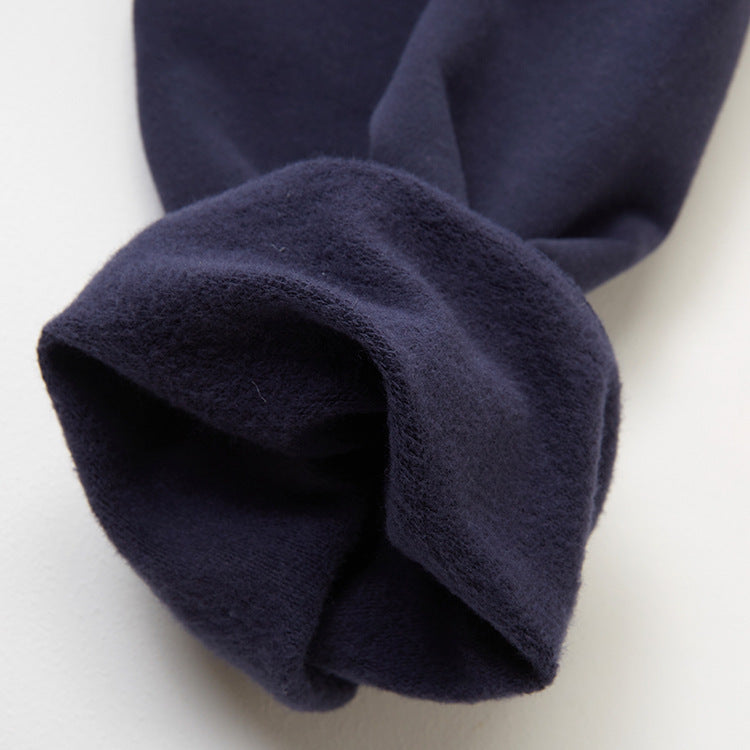 The wrong side of the long sleeve of the Women's Contemporary Hooded Corset in Comet color, highlighting the soft texture and quality of the premium cotton fabric. From Borcelleclothes.