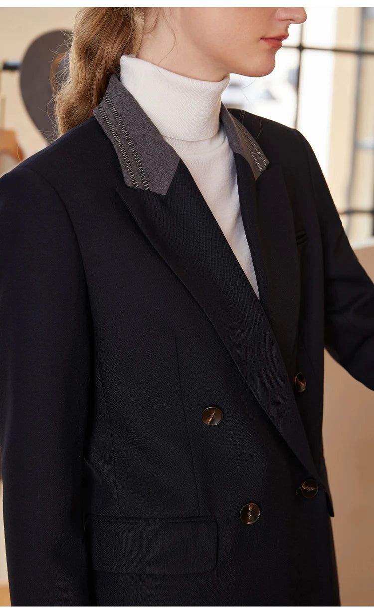 Upper part of woman wearing Mirage contrast-collar wool blazer with rhinestone trim — From Borcelleclothes.