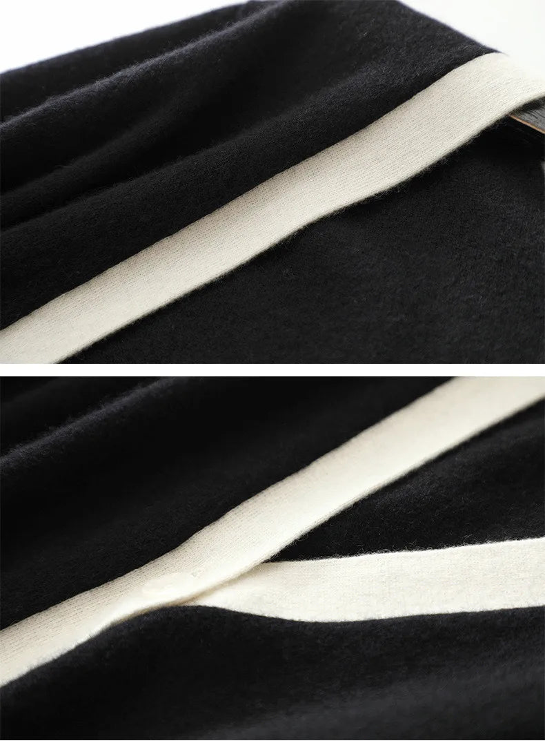 Onyx version shown in detail — soft shoulder shaping and contrasting light V-neck trim. — From Borcelleclothes.