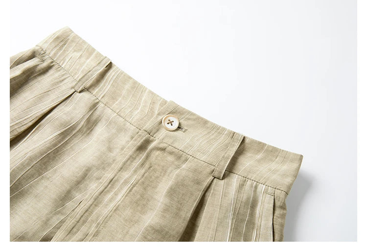 Detail of the waistband section of the Shadow trousers with visible texture. From Borcelleclothes.