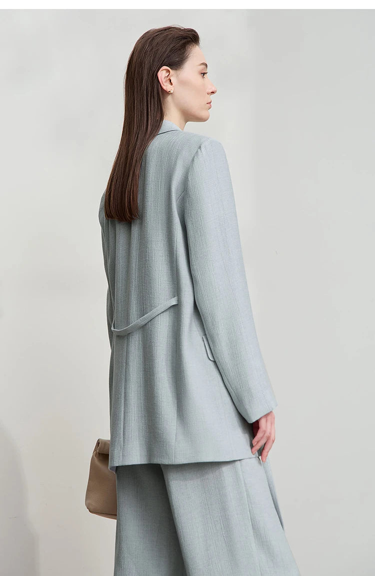 Side view of women’s Morning Blue crinkled viscose blazer – From Borcelleclothes.
