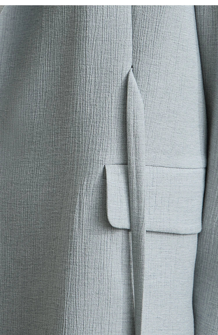 Pocket section of women’s Morning Blue crinkled viscose blazer – From Borcelleclothes.