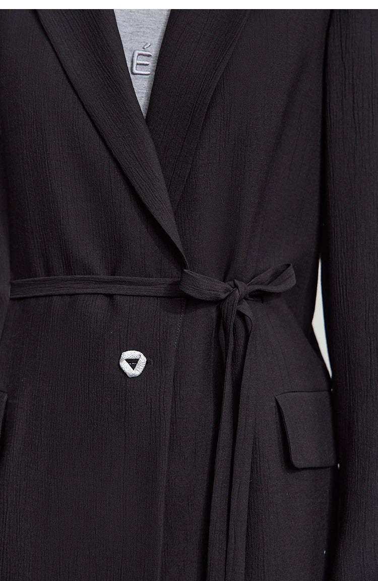 Waist section of women’s Onyx crinkled viscose blazer – From Borcelleclothes.