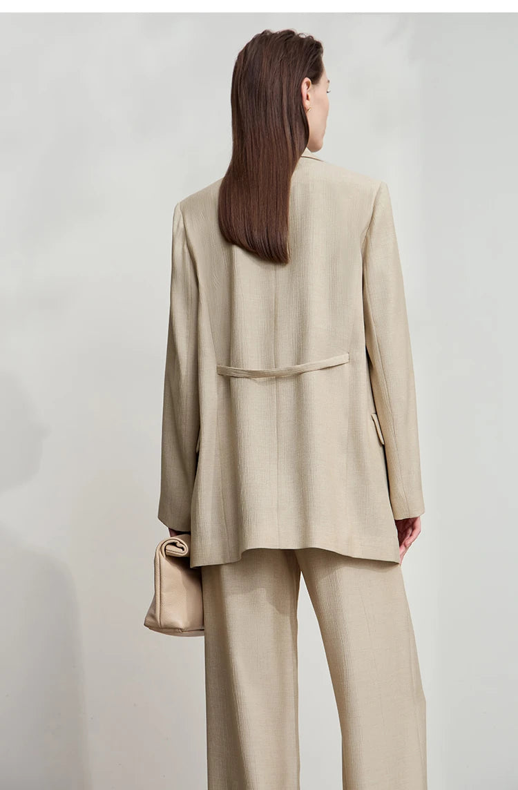 Back view of women’s Soft Amber crinkled viscose blazer – From Borcelleclothes.