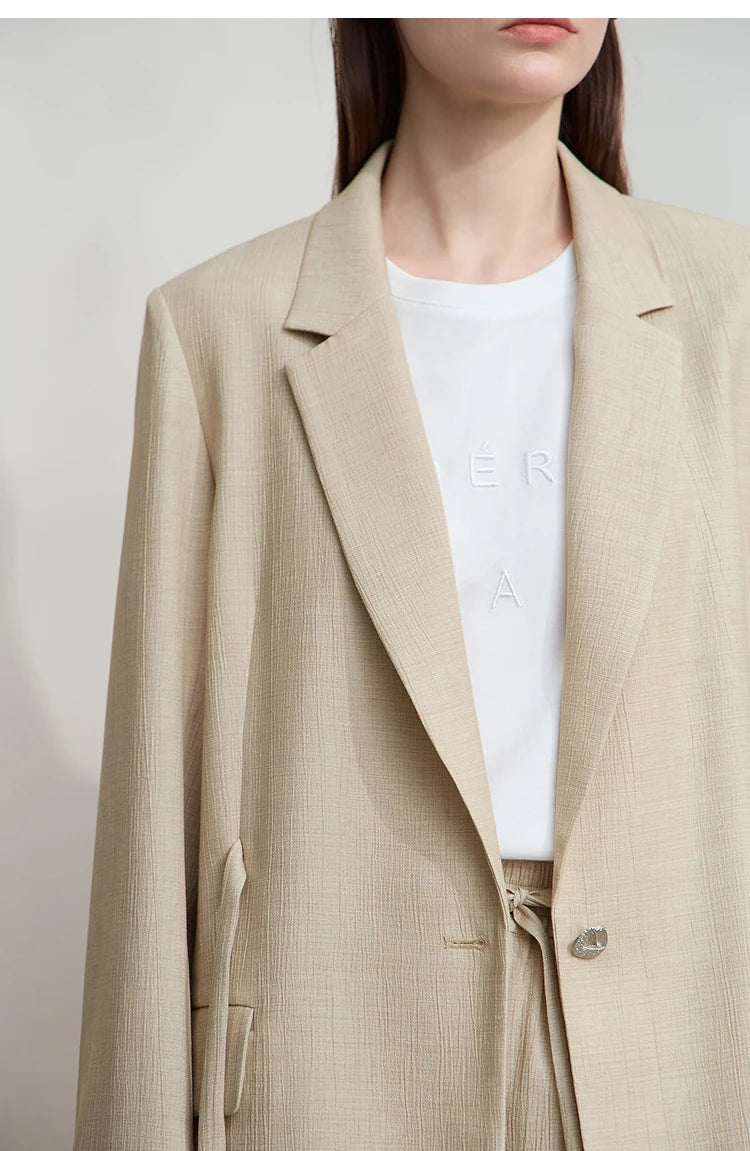 Upper section of women’s Soft Amber crinkled viscose blazer – From Borcelleclothes.