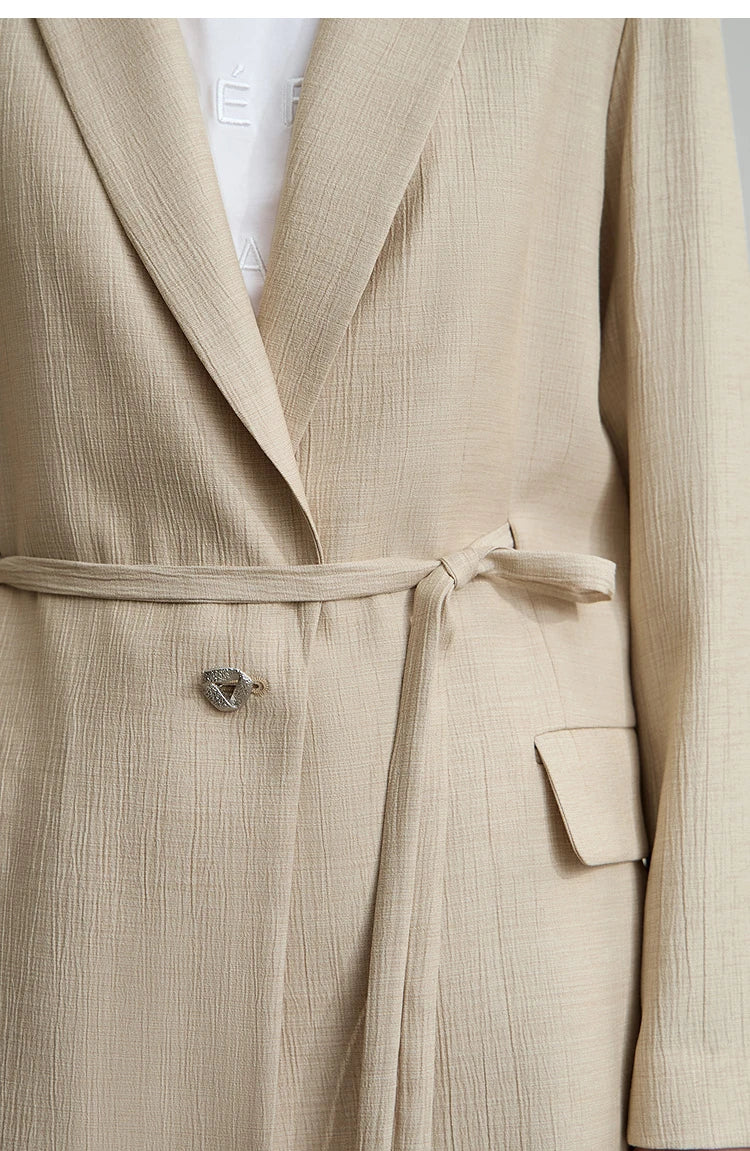 Waist section of women’s Soft Amber crinkled viscose blazer – From Borcelleclothes.