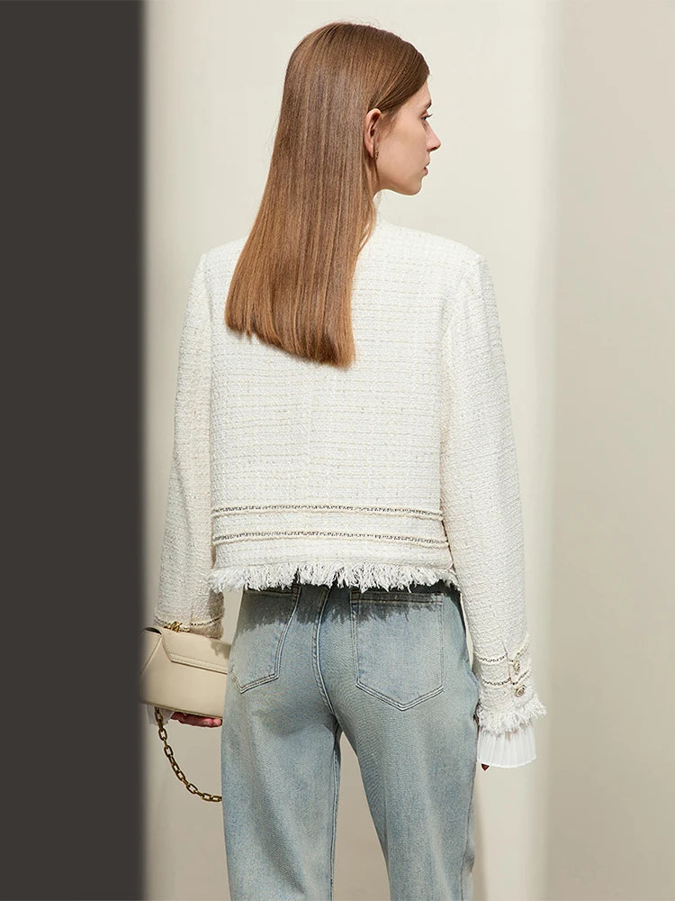 Model wearing Platinum cropped tweed jacket with sheer cuffs, back view – From Borcelleclothes.