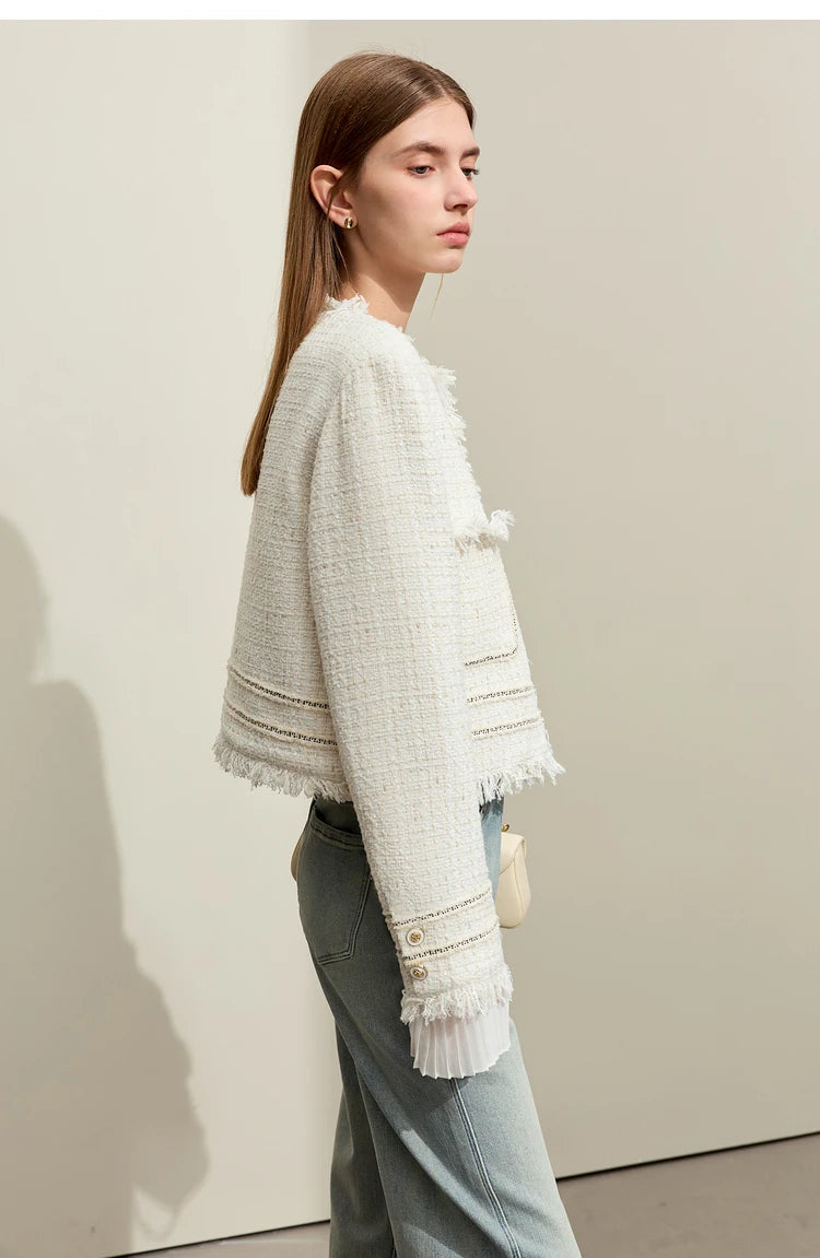 Model wearing Platinum cropped tweed jacket with sheer cuffs, right side view – From Borcelleclothes.