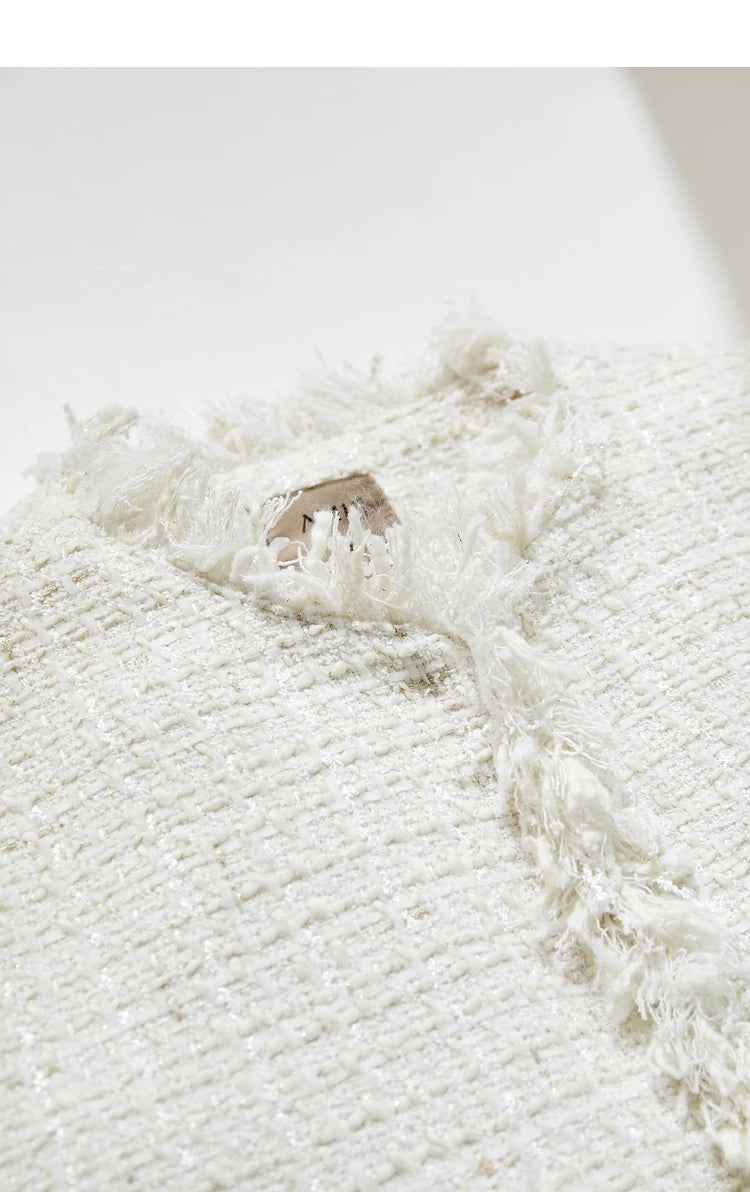 Platinum cropped tweed jacket with sheer cuffs, neckline close-up – From Borcelleclothes.