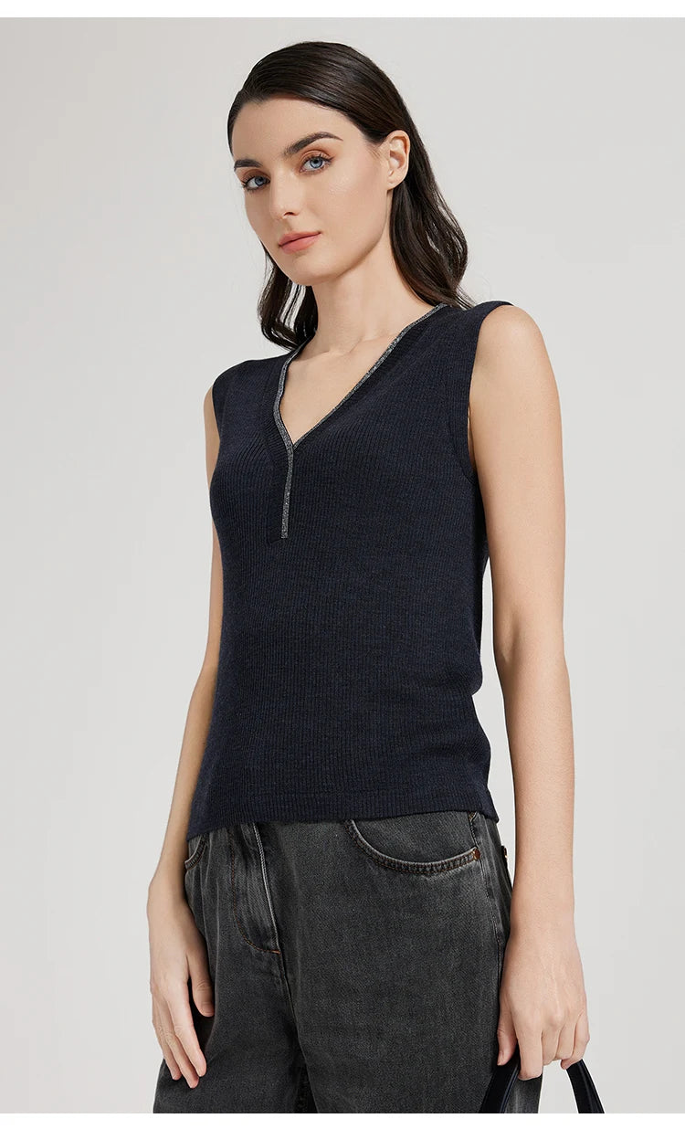 Model wearing Black Pearl ribbed top, holding an oversized bag at the side. From Borcelleclothes.