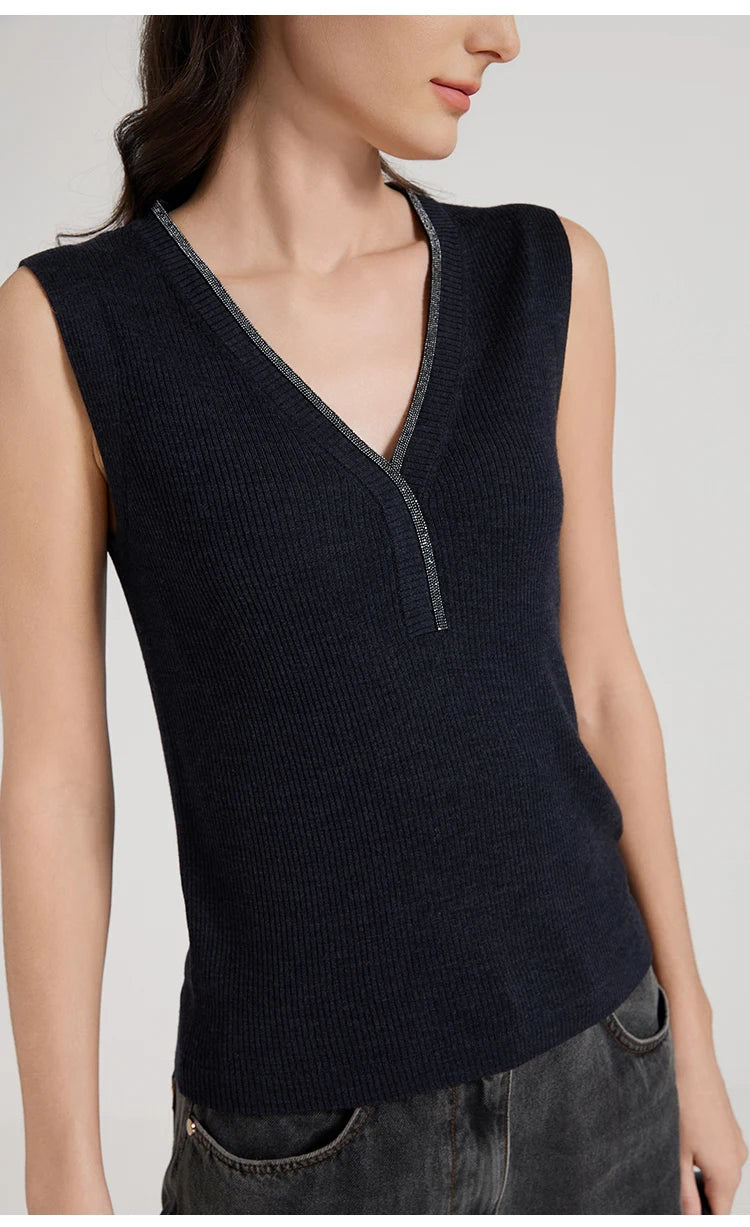 Model in Black Pearl ribbed top turned slightly to the left, revealing neckline and texture. From Borcelleclothes.