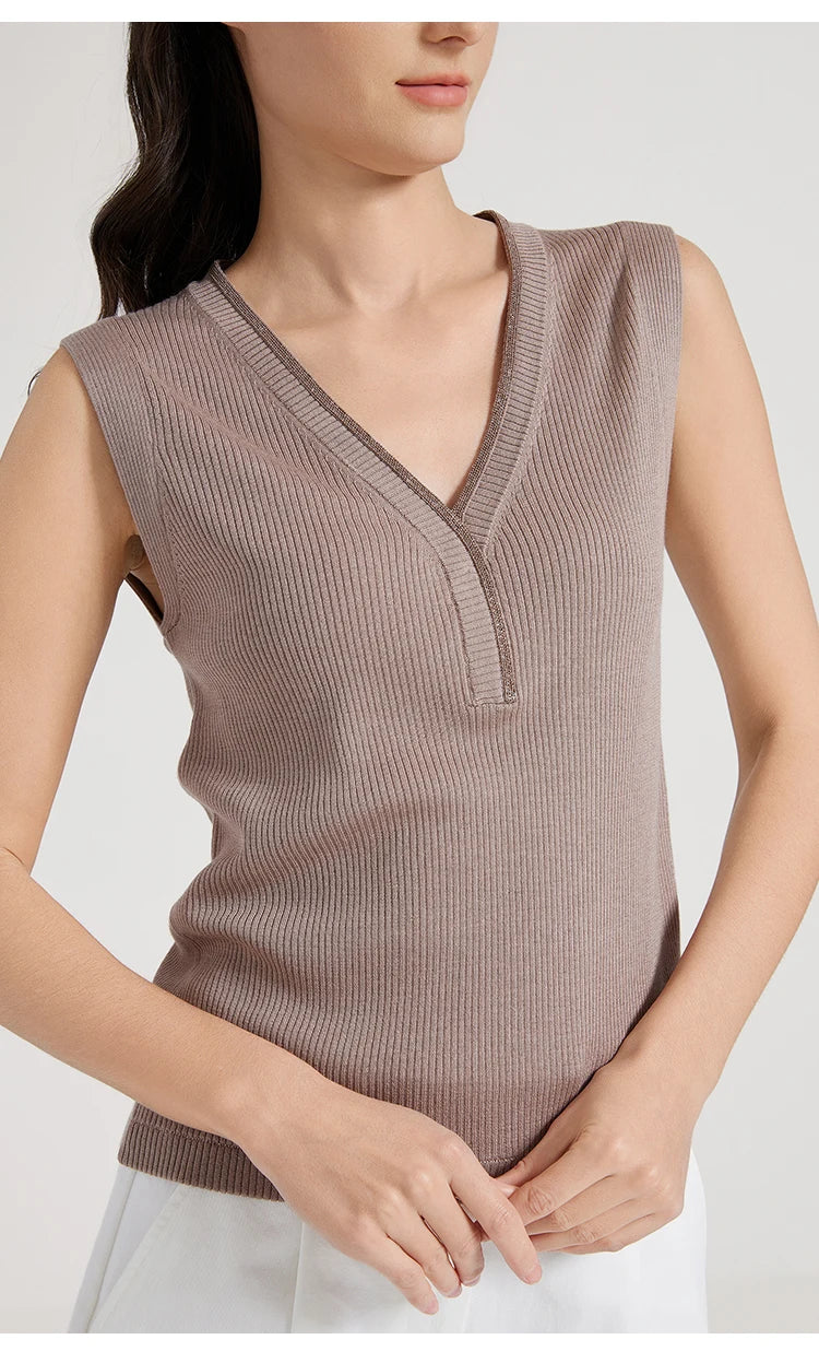 Model in Martini ribbed top turned slightly to the side, showing neckline and shoulder detail. From Borcelleclothes.