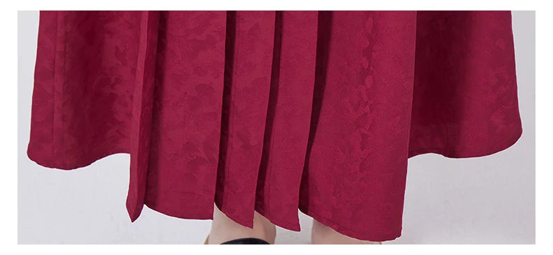Lower part of the Dark Raspberry Jacquard Silk Dress with hidden pleats. From Borcelleclothes.