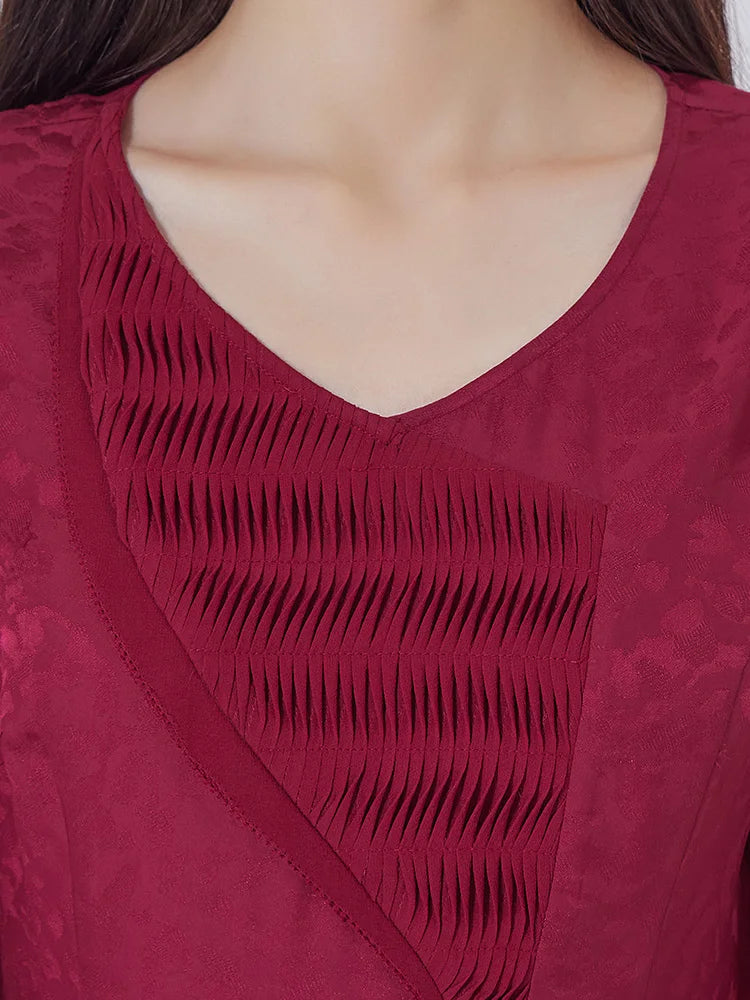 Upper front view of Dark Raspberry Jacquard Silk Dress with tucked appliqué. From Borcelleclothes.