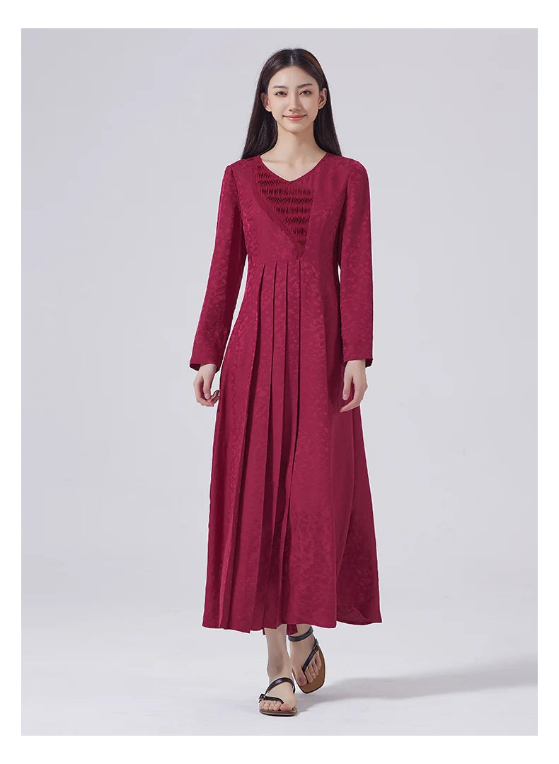 Model stepping forward in Dark Raspberry Jacquard Silk Dress. From Borcelleclothes.