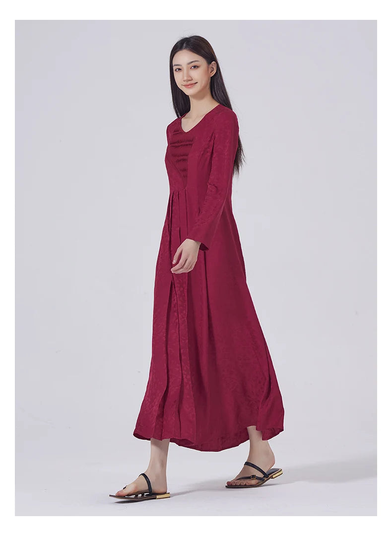 Model steps to the left in Dark Raspberry Jacquard Silk Dress. From Borcelleclothes.