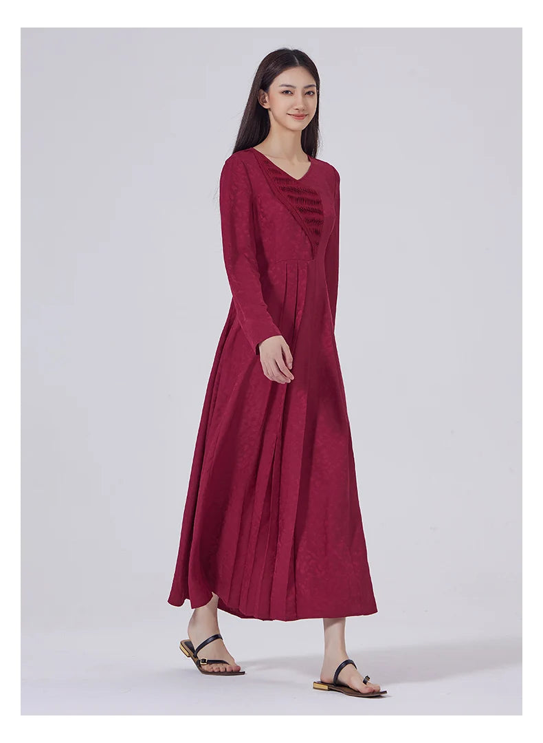 Side view of model walking in Dark Raspberry Jacquard Silk Dress. From Borcelleclothes.