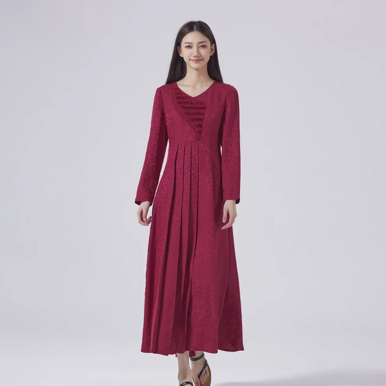 Women's dark raspberry jacquard silk dress with asymmetrical tucked appliqué and concealed knife pleats at front and back. From Borcelleclothes.