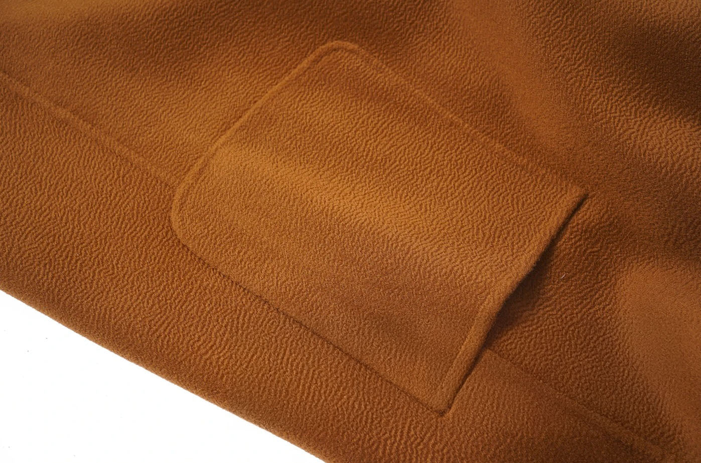 Close-up of patch pocket on the Women's Double-Sided Cashmere Wrap coat in Sienna. From Borcelleclothes.