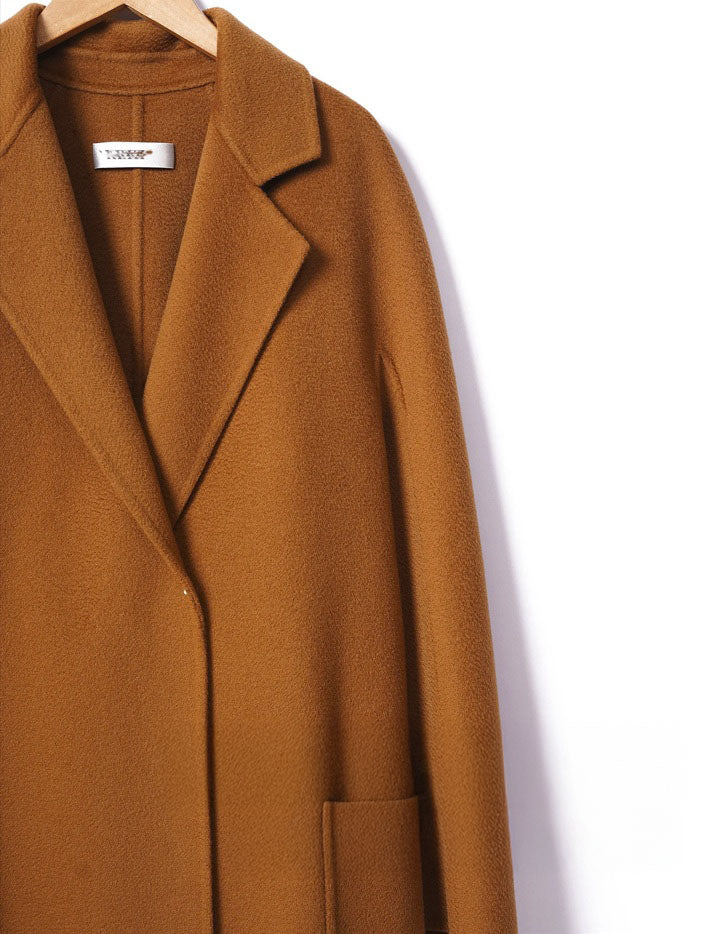 Upper left part detail of a Women's Double-Sided Cashmere Wrap Coat in Sienna. From Borcelleclothes.