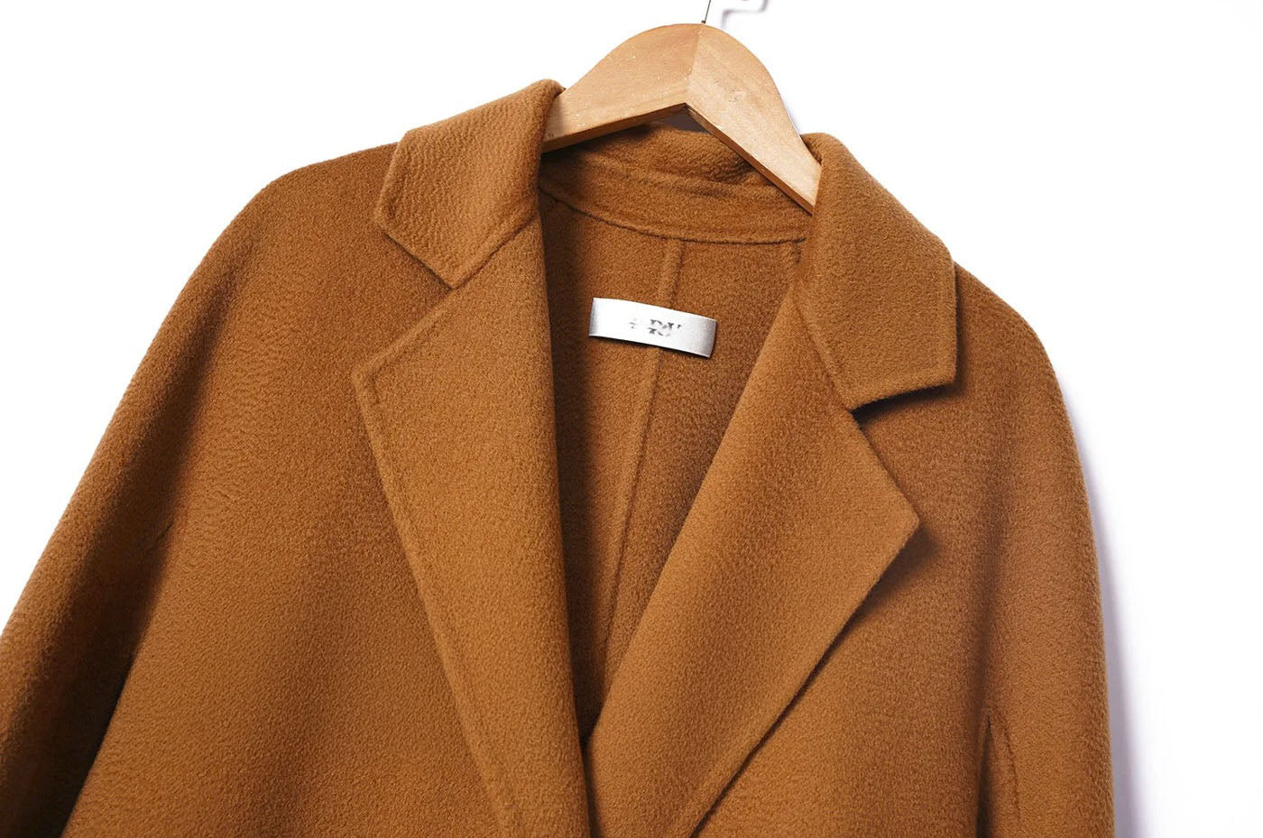 Upper section with lapels and shoulders of a Women's Double-Sided Cashmere Wrap Coat in Sienna. From Borcelleclothes.