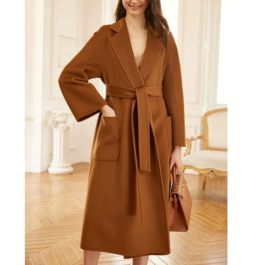 Women's Double-sided cashmere wrap coat in Sienna with notched lapels and patch pockets, secured with a matching belt. From Borcelleclothes.