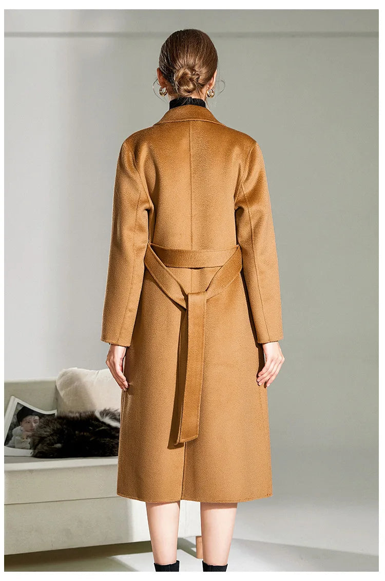 The Back of the Women's Double-Sided Wool-Cashmere Coat in Brown Sugar, emphasizing the streamlined silhouette and impeccable tailoring. From Borcelleclothes.