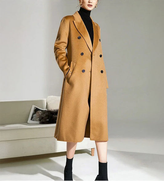 Women's Double-Sided Wool-Cashmere Coat in Brown Sugar, showcasing luxurious peaked lapels, a straight silhouette, and meticulously tailored details like single-welt pockets with buttonholes, crafted from a premium wool-cashmere blend for warmth and refinement. From Borcelleclothes.