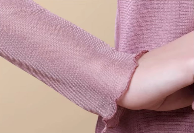 Ruffled sleeve end on women's dual-layer silk top in Lily, highlighting delicate gauze silk details. From Borcelleclothes.